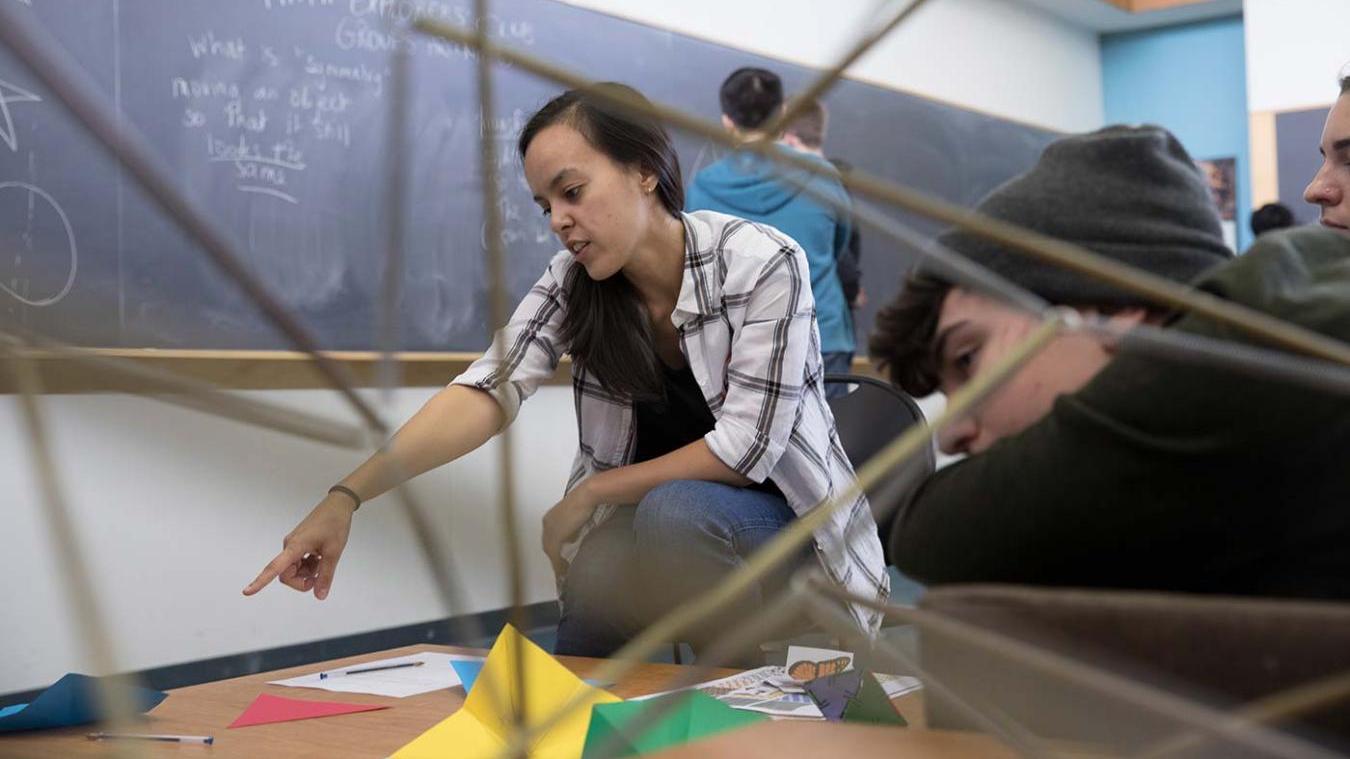 Math graduate student working with students